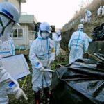 Radioactive contamination cleanup operation around a school in the Katsurao area near the Fukushima nuclear power plant, December 4, 2011.