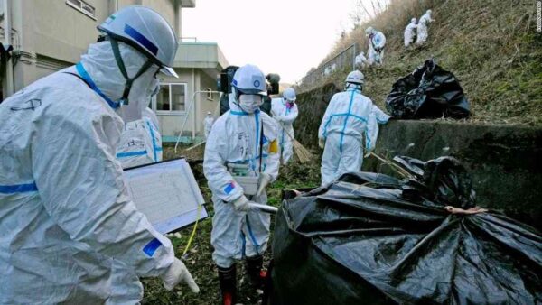 Radioactive contamination cleanup operation around a school in the Katsurao area near the Fukushima nuclear power plant, December 4, 2011.