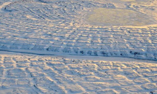 The special shape of the Alaskan ice caps