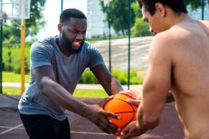 The standard model in the game of basketball for the strong nuclear force