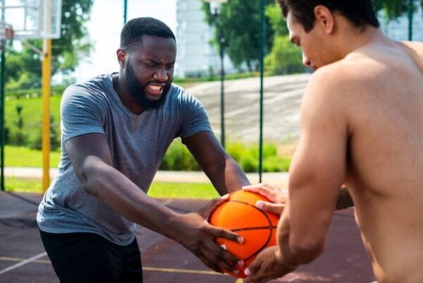 The standard model in the game of basketball for the strong nuclear force