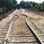 What may happen to train rails due to thermal expansion