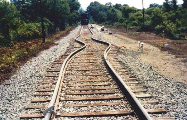 What may happen to train rails due to thermal expansion